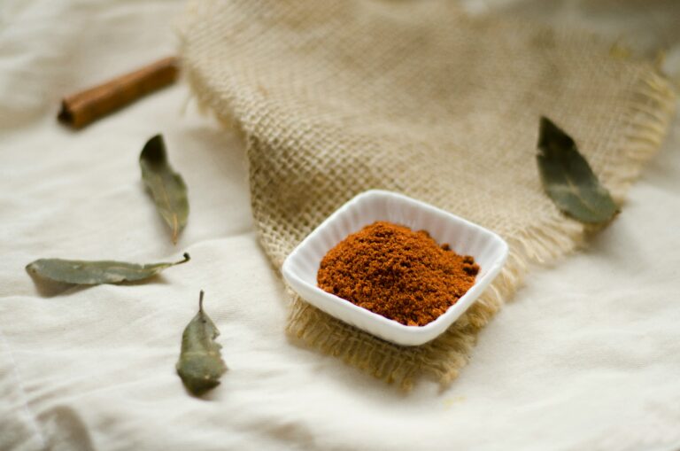 bean on a table with green leaves